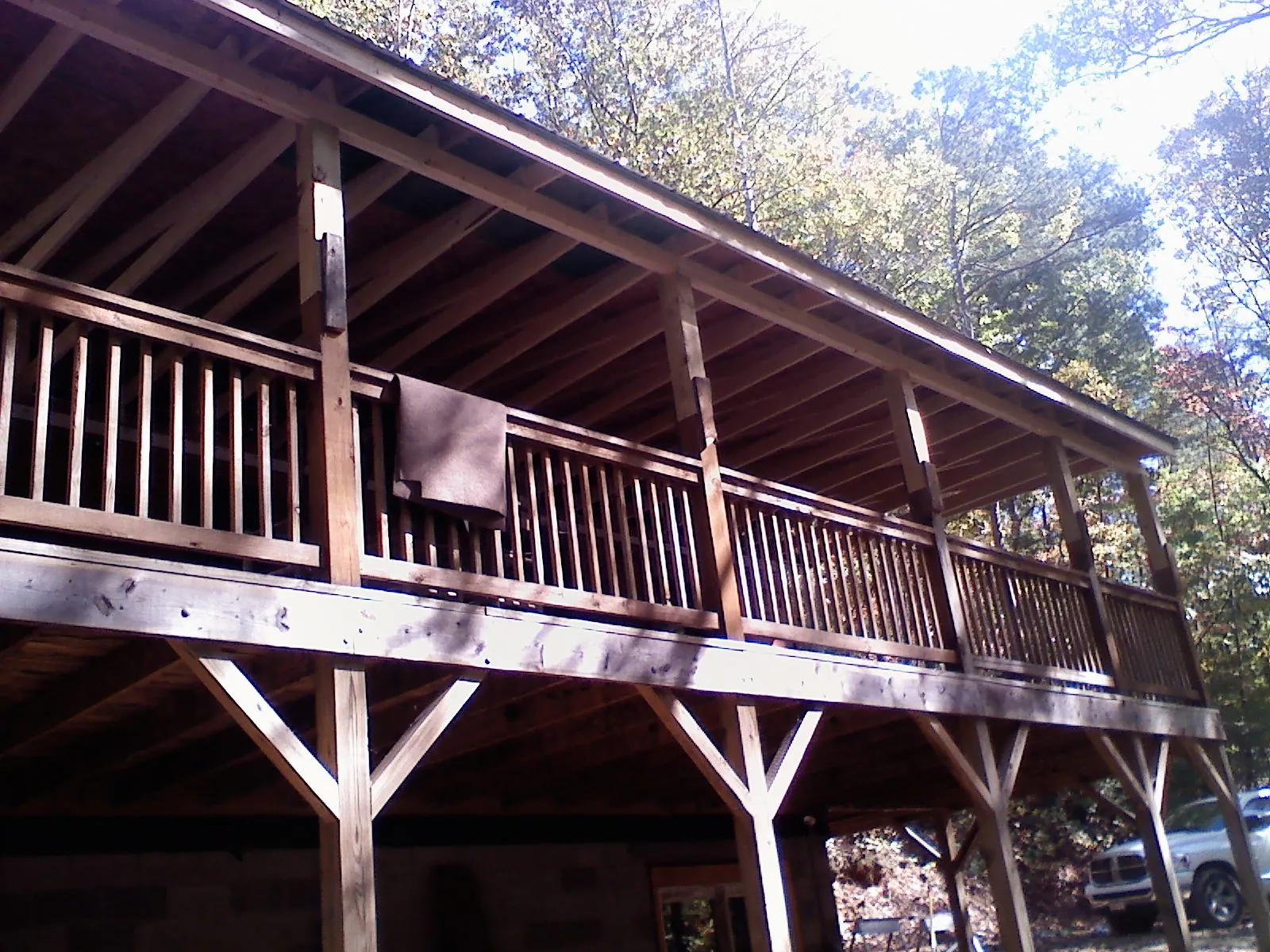 Timber framing under a new elevated porch and deck — Roof Leak Repair in Beecher by Roofing Brothers